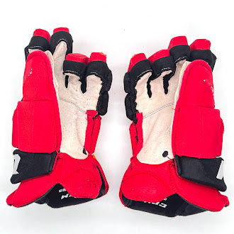 CCM HGJS - Gant d'occasion NHL Pro Stock - Hurricanes de la Caroline (rouge/noir)